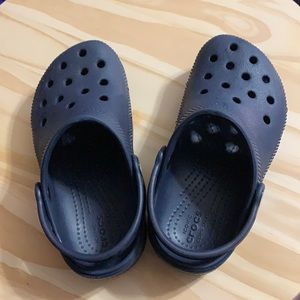 Crocs.  Barely worn by grand daughter before outgrown.  Dark blue